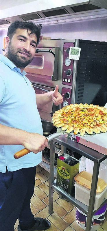 Waheed Talwar at his food business, Castle Pizza in Millstreet. Waheed Talwar at his food business, Castle Pizza in Millstreet.