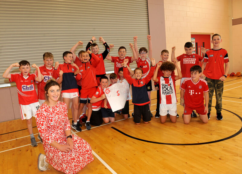 Linda Collins with sixth class boys at Glenville National School showing their support. Picture: Larry Cummins Linda Collins with sixth class boys at Glenville National School showing their support. Picture: Larry Cummins