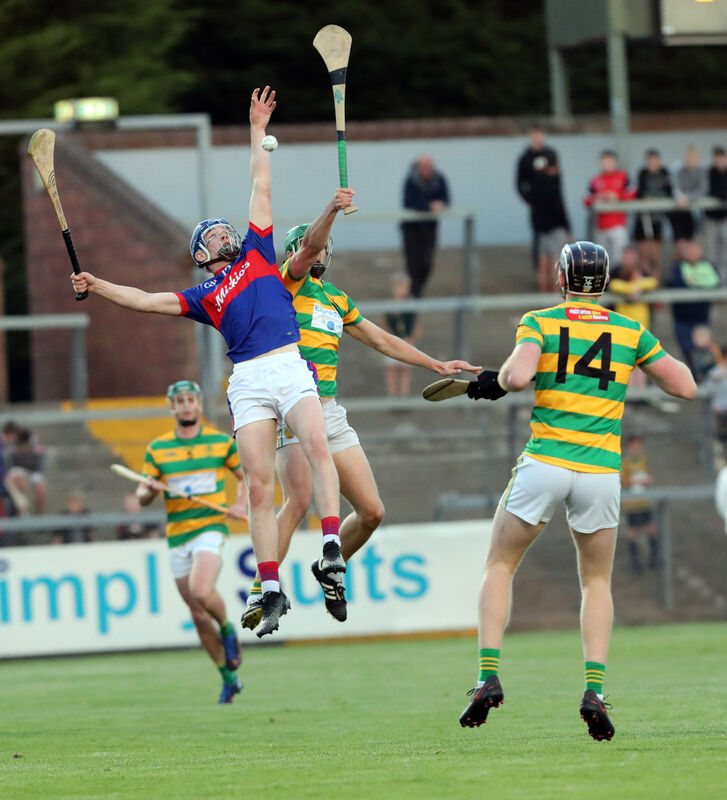  John Cashman, Blackrock, and Cathal Lenihan, Erin's Own, battle in the air. Picture: Jim Coughlan.