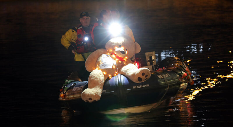 Members of the Cork City Missing Persons Search and Recovery, on the river during the service. Members of the Cork City Missing Persons Search and Recovery, on the river during the service.
