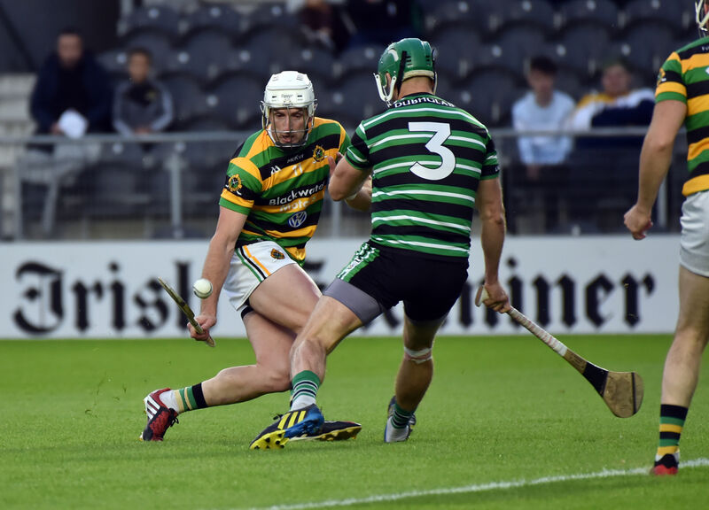 Glen Rover's Patrick Horgan and Douglas defender Eoin Cadogan challenge for the sliotar. Picture: Eddie O'Hare