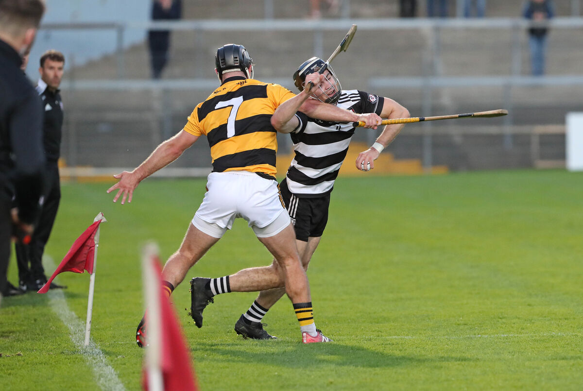 Sam Quirke, Midleton, breaks past Gordon Joyce, Na Piarsaigh. Picture: Jim Coughlan. Sam Quirke, Midleton, breaks past Gordon Joyce, Na Piarsaigh. Picture: Jim Coughlan.