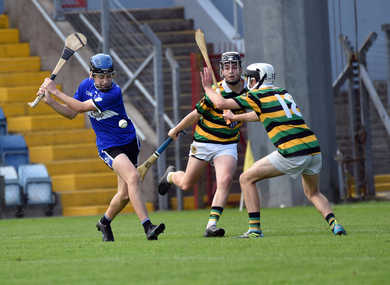 Sarsfields' Barry O'Flynn shoots from Glen Rovers' Oisin O'Connell and David O'Mahoney. Picture: Eddie O'Hare