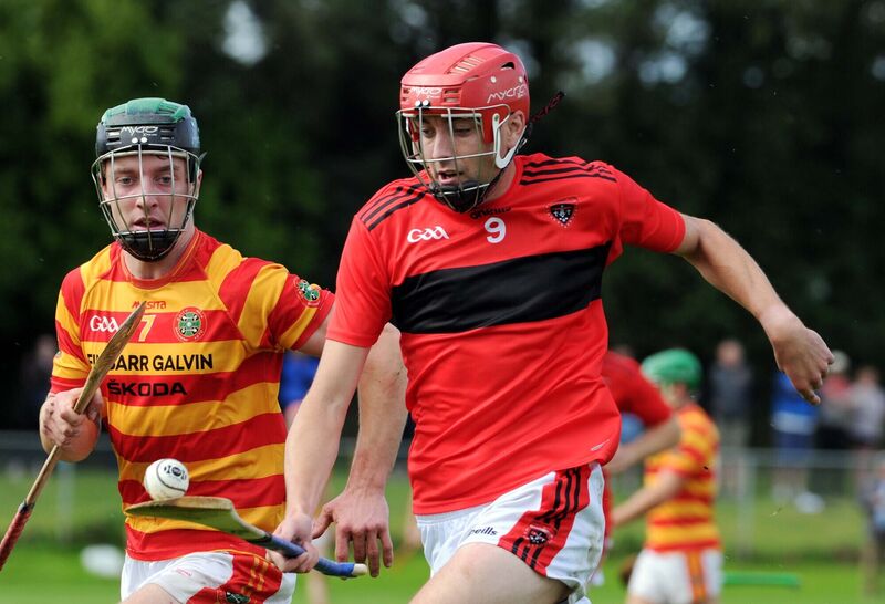 Cloyne's Briain Minihane soloing downfield. Picture: Denis Minihane.