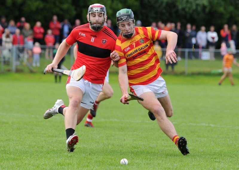 Newcestown's Colm O'Donovan and Cloyne's Paudie O'Sullivan in a race to win the ball. Picture: Denis Minihane.