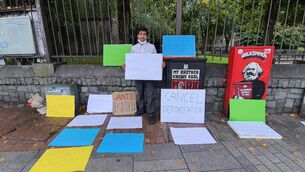 <p>Nadim Hussain staged a protest in Cork City today following a letter from the International Protection Appeal Tribunal.</p>