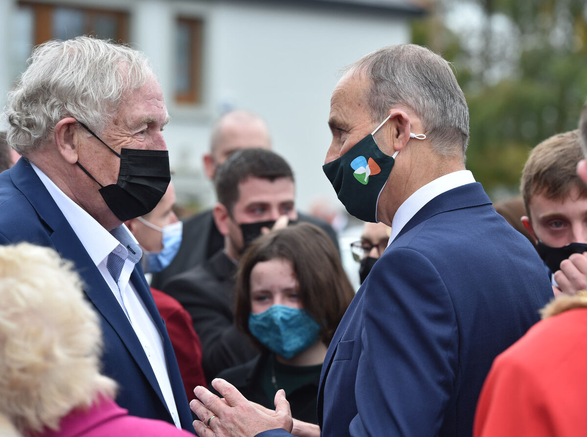 Dr Con Murphy and Taoisech Micheal Martin after the remains of Billa O’Connell are removed from The Lough Church , Cork following his funeral Dr Con Murphy and Taoisech Micheal Martin after the remains of Billa O’Connell are removed from The Lough Church , Cork following his funeral