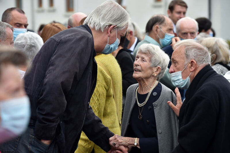 Theatre Producer and Director Pat Talbot consoles Nell, widow of Billa O'Connell, after the funeral. Theatre Producer and Director Pat Talbot consoles Nell, widow of Billa O'Connell, after the funeral.