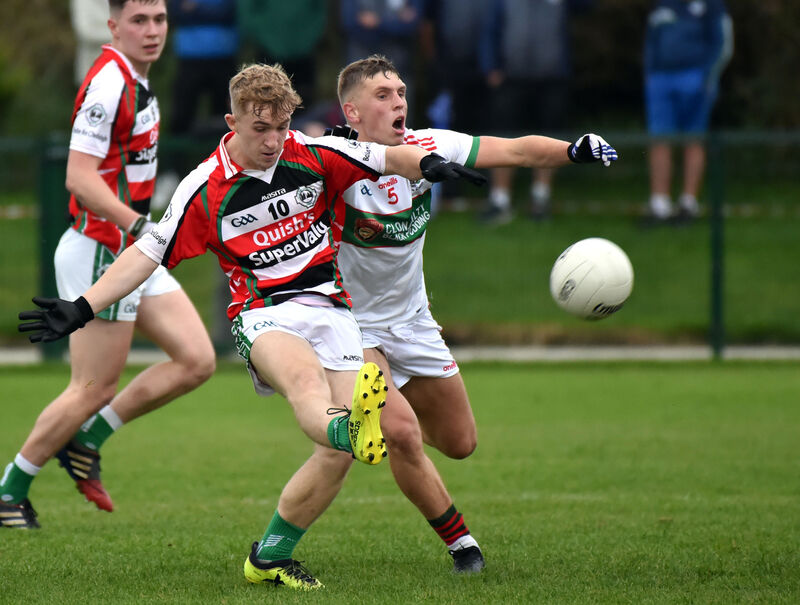 Ballincollig's Mark Oldham shoots from Clonakilty's Sean White. Picture: Eddie O'Hare