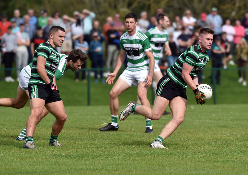 Douglas' Kevin Flahive breaks up field watched by Sean Powter against Valley Rovers. Picture: Eddie O'Hare Douglas' Kevin Flahive breaks up field watched by Sean Powter against Valley Rovers. Picture: Eddie O'Hare