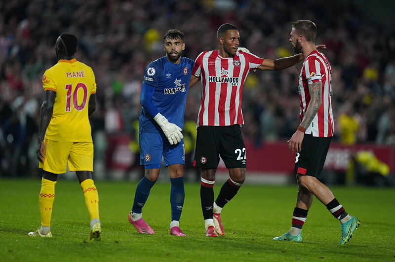 Brentford goalkeeper David Raya Martin (second left), Mathias Jorgensen (second right) and Pontus Jansson (right) celebrate at the final whistle of their Premier League match against Liverpool at Brentford Community Stadium, London. Picture: Adam Davy/PA Wire. Brentford goalkeeper David Raya Martin (second left), Mathias Jorgensen (second right) and Pontus Jansson (right) celebrate at the final whistle of their Premier League match against Liverpool at Brentford Community Stadium, London. Picture: Adam Davy/PA Wire.