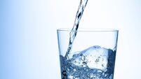 A Glass of water on white background