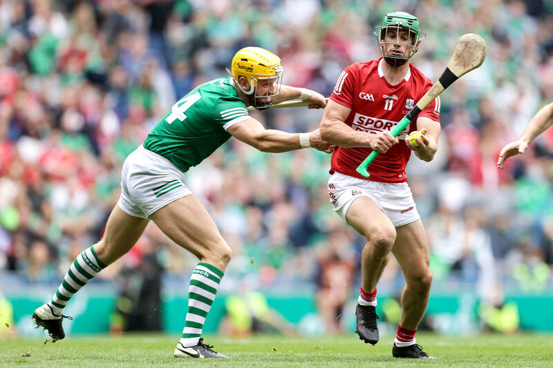 Cork's Seamus Harnedy and Seamus Flanagan of Limerick. Picture: INPHO/Laszlo Geczo