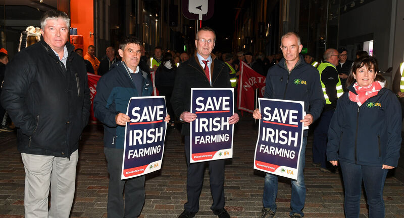  Conor O'Leary, Cork Central, Donal O'Donovan, West Cork, Tim Cullinan, IFA president, Harold Kingston, Munster Regional Chairman and Anne Baker, North Cork, taking part in the IFA protest in Cork city.