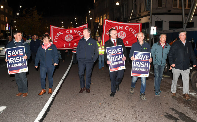  IFA president Tim Cullinan, fourth left and supporters, leading the way during the IFA protest in Cork city.