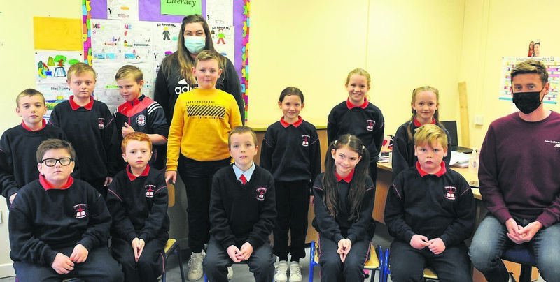 Scoil Padre Pio National School, Churchfield, pupils with teacher Mr Shine and SNA Charlene Collins.	Picture: Larry Cummins
                    