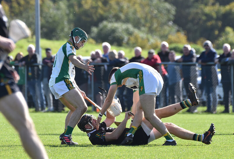 Dean Brosnan, Glen Rovers, ends up on the grass after a clash with Newtownshandrum players Conor Griffin and Conor Twomey. Picture: Dan Linehan Dean Brosnan, Glen Rovers, ends up on the grass after a clash with Newtownshandrum players Conor Griffin and Conor Twomey. Picture: Dan Linehan