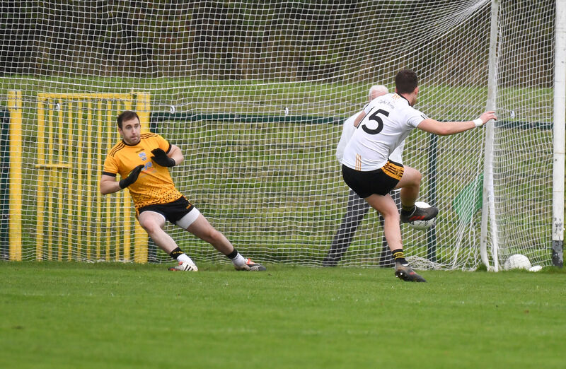  Clyda Rovers' Colin Kelly scores from the penalty spot past Fermoy's Liam Coleman. Picture: David Keane.