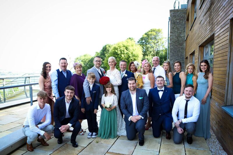 The couple with their guests outdoors at the hotel. The weather was amazing, with temperatures reaching 28 degrees on the day. The hotel overlooks Oysterhaven Bay. The couple with their guests outdoors at the hotel. The weather was amazing, with temperatures reaching 28 degrees on the day. The hotel overlooks Oysterhaven Bay.