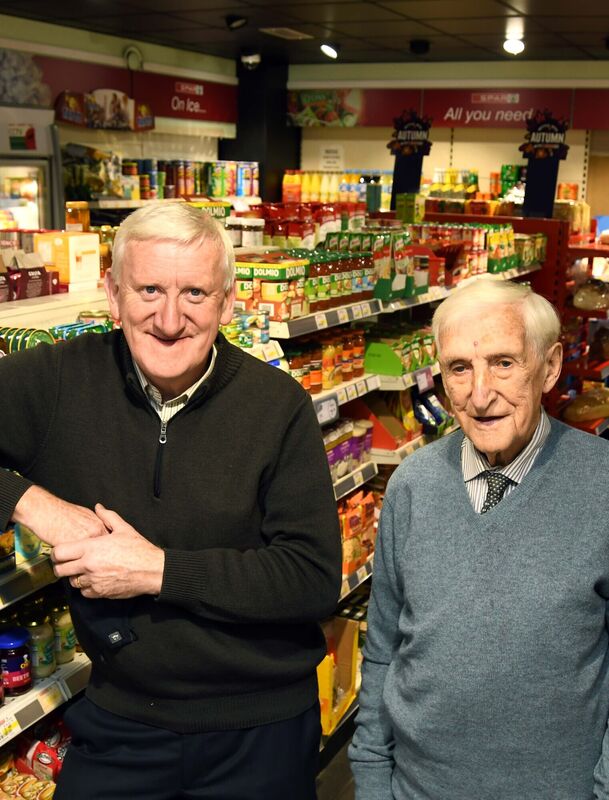 Michael and Brian Shinnick, proprietors, in Shinnick's Spar shop, Fermoy.
