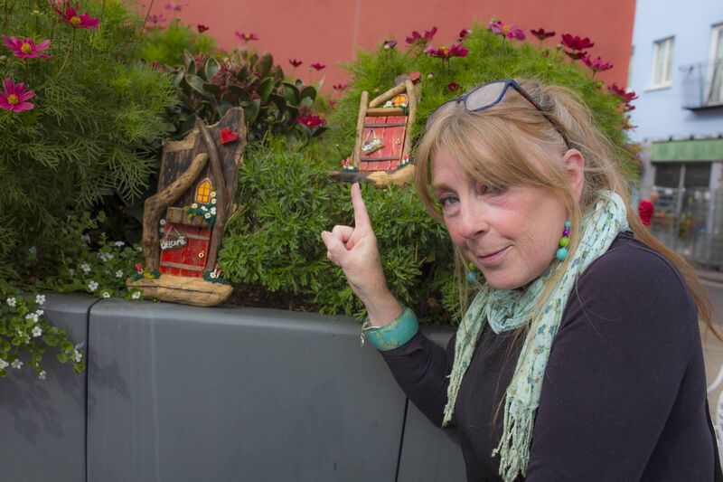 Corrine Leland with some of the fairy doors. Picture: Leonard Stone