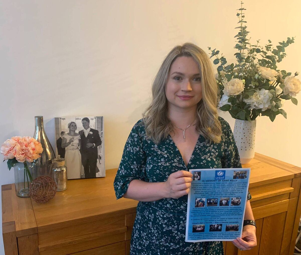 Pictured with a picture of her late mother Anne Kelly, is Deborah ( Kelly) White, Anne’s youngest daughter who is based in Sydney, during their UNICEF Get a Vaccine - Give a Vaccine campaign. Picture: Supplied. Pictured with a picture of her late mother Anne Kelly, is Deborah ( Kelly) White, Anne’s youngest daughter who is based in Sydney, during their UNICEF Get a Vaccine - Give a Vaccine campaign. Picture: Supplied.