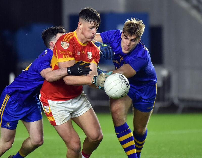 Éire Óg's Colm O'Callaghan under pressure from St Finbarr's Colm Scully and Ian Maguire. Picture: Eddie O'Hare Éire Óg's Colm O'Callaghan under pressure from St Finbarr's Colm Scully and Ian Maguire. Picture: Eddie O'Hare