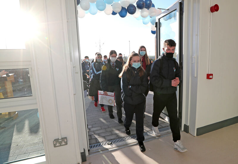 The sun shines on students returning from mid-term break to a brand new multi-million state-of-the-art school building, at Gaelcholaiste Charraig Ui Leighin, Carrigaline. Picture: Jim Coughlan. The sun shines on students returning from mid-term break to a brand new multi-million state-of-the-art school building, at Gaelcholaiste Charraig Ui Leighin, Carrigaline. Picture: Jim Coughlan.