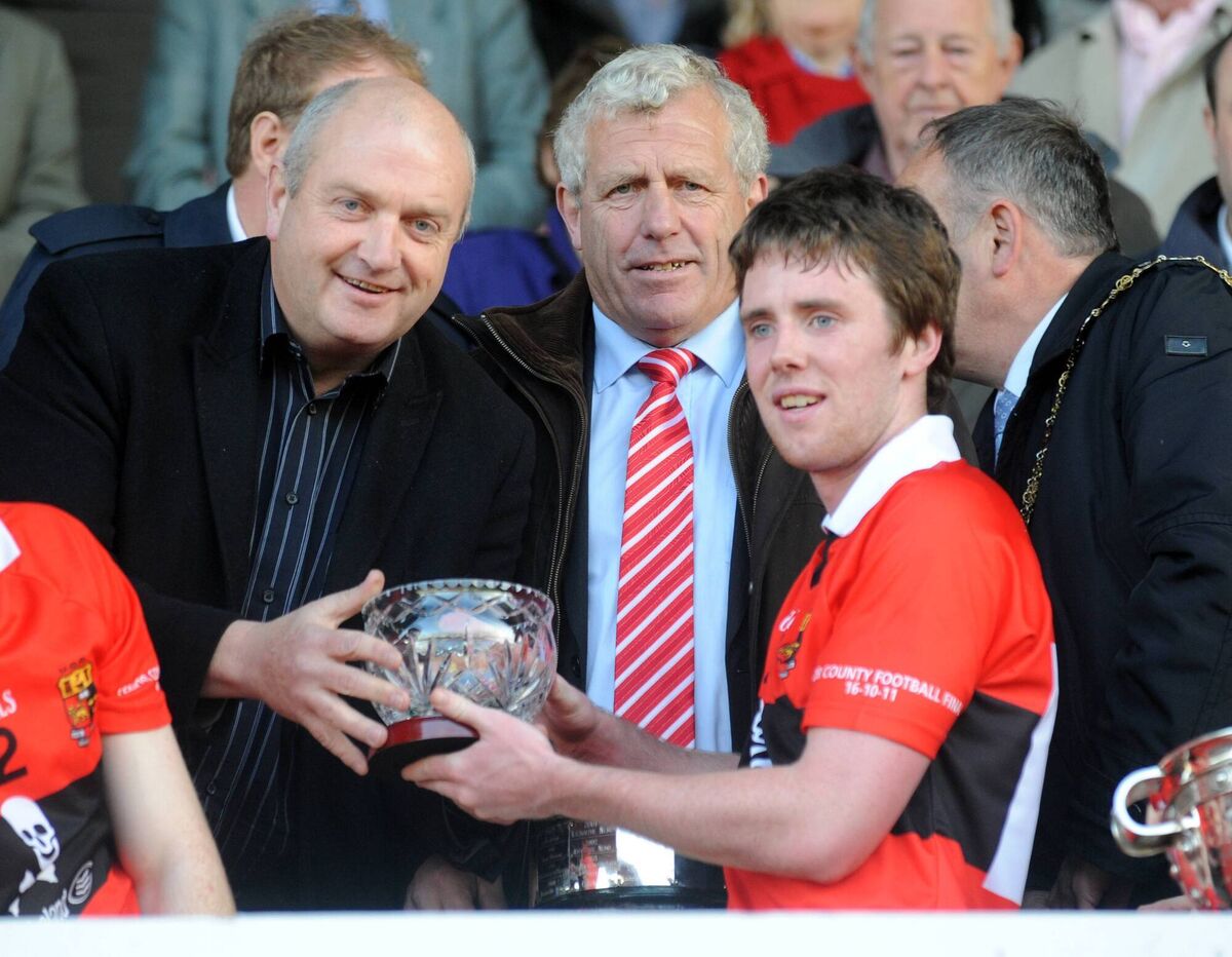 Diarmuid O'Donovan presents the Man of the Match award to UCC captain Sean Kiely. Picture: Eddie O'Hare Diarmuid O'Donovan presents the Man of the Match award to UCC captain Sean Kiely. Picture: Eddie O'Hare