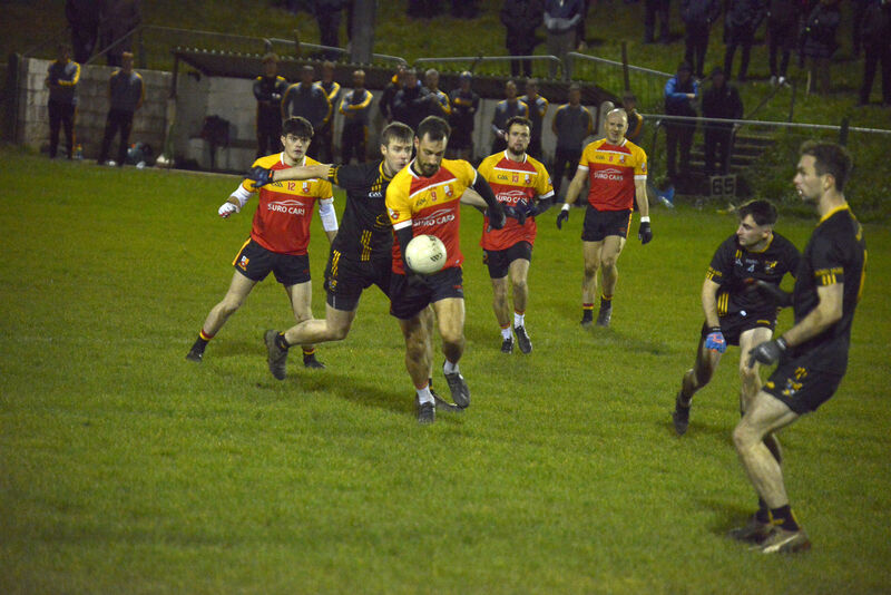 
                        Tadhg Mac Cárthaigh's Kevin O'Driscoll stepping out away from the challenge of St Mary's Cillian McGillicuddy. Picture: Denis Boyle