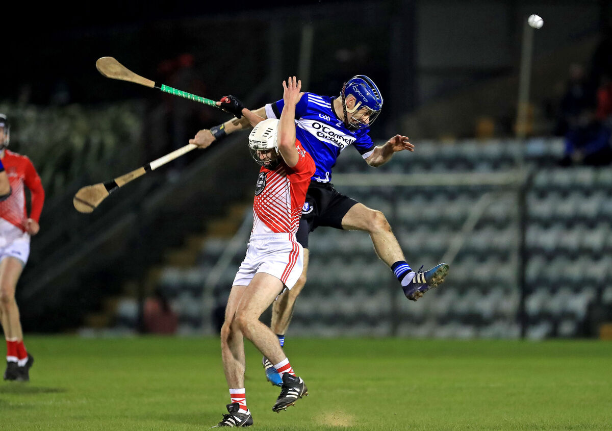  Tadhg Óg Murphy, Sarsfields, contesting the dropping ball with David O'Neill, Mayfield. Picture: Jim Coughlan.