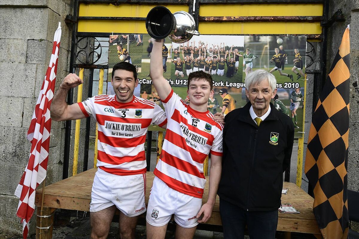 Ballygiblin Man of the Match Darragh Flynn celebrates with team captain Fionn Herlihy, alongside Avondhu chairman Arthur Coakley. Picture: John Tarrant Ballygiblin Man of the Match Darragh Flynn celebrates with team captain Fionn Herlihy, alongside Avondhu chairman Arthur Coakley. Picture: John Tarrant