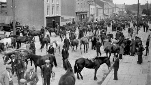 <p class="contextmenu internal_Caption">TRADING DAY: A bustling scene at the Cahirmee Horse Fair in Buttevent’s main street, on July 11, 1939.</p>