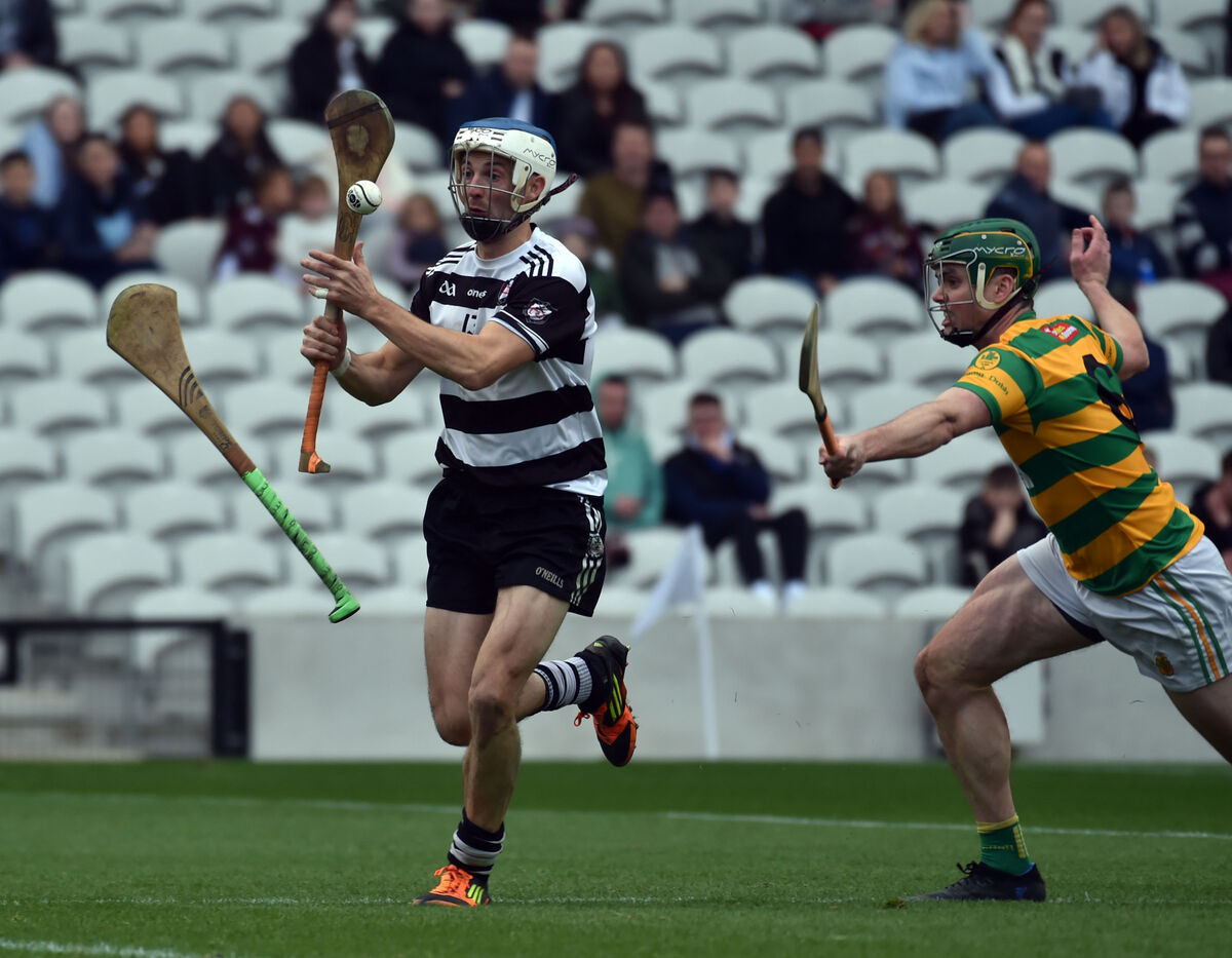 Midleton's Luke O'Farrell breaks from Blackrock's Cathal Cormack and a flying hurley at Páirc Uí Chaoimh. Picture: Eddie O'Hare Midleton's Luke O'Farrell breaks from Blackrock's Cathal Cormack and a flying hurley at Páirc Uí Chaoimh. Picture: Eddie O'Hare