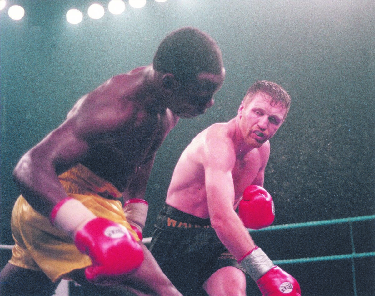 Sporting heroes: Steve Collins rocks Chris Eubank when winning his world super middleweight title fight against Chris Eubank in Millstreet, Co. Cork, in 1995. Picture: Dan Linehan, Irish Examiner. Sporting heroes: Steve Collins rocks Chris Eubank when winning his world super middleweight title fight against Chris Eubank in Millstreet, Co. Cork, in 1995. Picture: Dan Linehan, Irish Examiner.