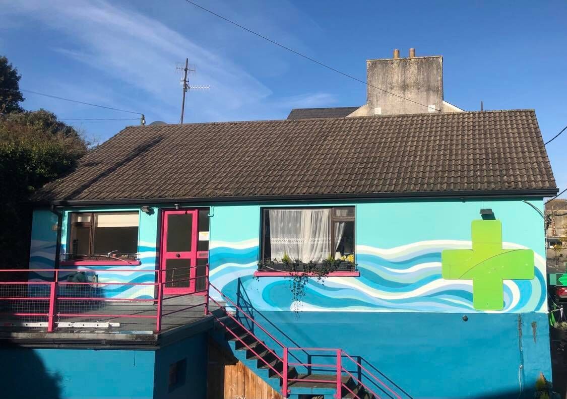 Jamie Howard's mural at Passage West Pharmacy. 