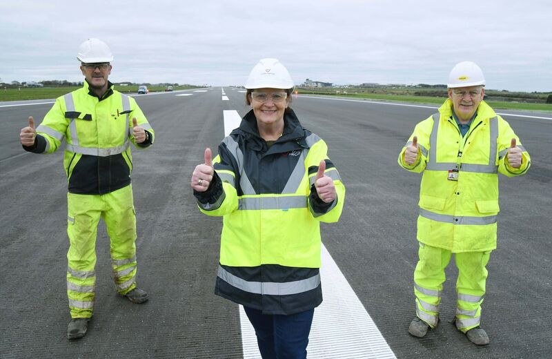 Pictured on the new runway at Cork Airport ahead of reopening for flights at 02.00 hours on Monday are (from left) Brian Culloty, head of airside infrastructure and resident engineer, Cork Airport; Kathleen Walshe, communications specialist, Cork Airport, and David Fraser, project director, Colas, main contractors. Pictured on the new runway at Cork Airport ahead of reopening for flights at 02.00 hours on Monday are (from left) Brian Culloty, head of airside infrastructure and resident engineer, Cork Airport; Kathleen Walshe, communications specialist, Cork Airport, and David Fraser, project director, Colas, main contractors.