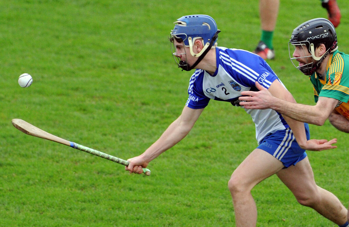 Belgooly's Chris O'Sullivan challenged by Newtownshandrum's Gerry O'Mahony in the Co-op Superstores Cork JBHC final at Mallow. Picture: Denis Minihane.