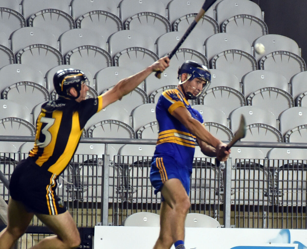 Lisgoold's Mark Hegarty shoots over a point from Kilbrittain's James Hurley. Picture: Eddie O'Hare Lisgoold's Mark Hegarty shoots over a point from Kilbrittain's James Hurley. Picture: Eddie O'Hare