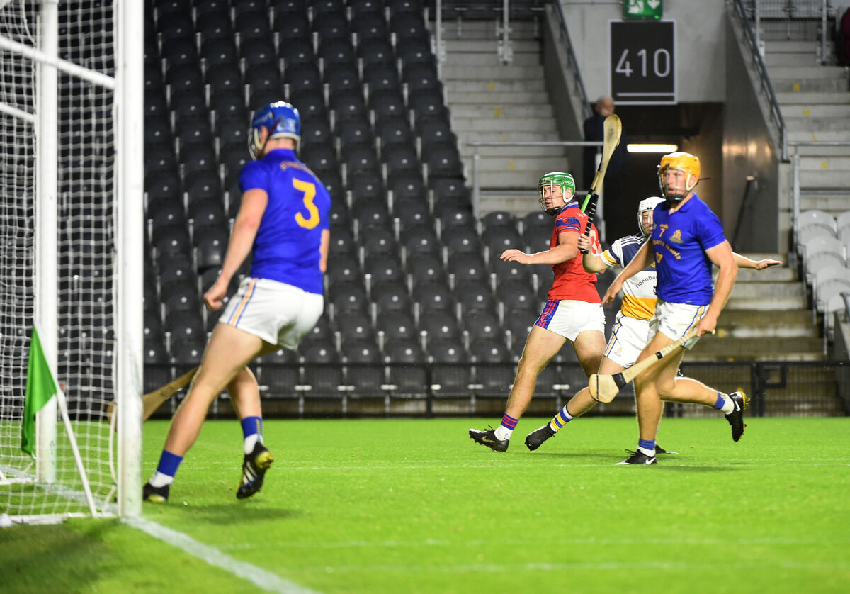  Goalscorer Robbie O'Flynn hits the net for Erin's Own against St Finbarr's. Picture: Larry Cummins.