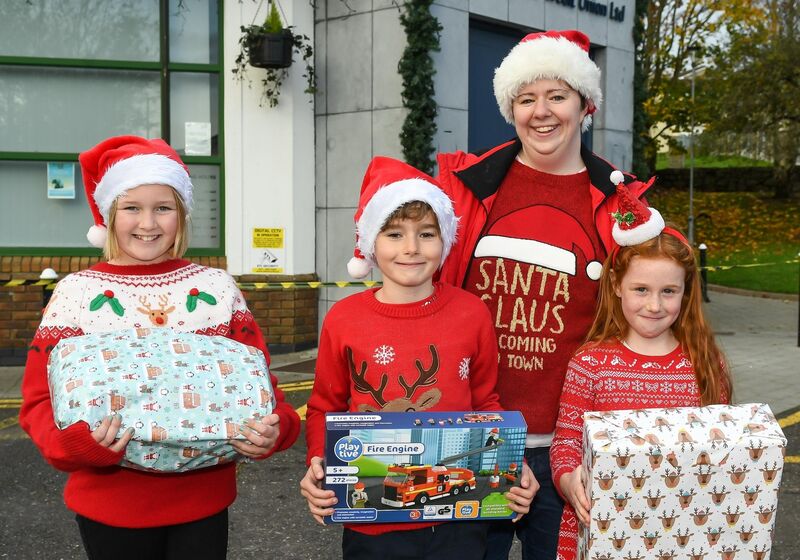  Volunteer Sarah Lynch with local children Sarah and Matthew Whittaker and Faye Mulcahy, at the launch of the Toy Appeal Drive By in aid of local charities in Glanmire. Picture: David Keane.