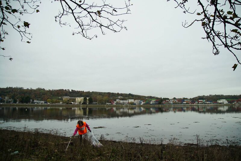 Volunteer Caroline Davy, a member of the Blackrock community cleans the coast next to the castle. Picture: Mostafa Darwish Volunteer Caroline Davy, a member of the Blackrock community cleans the coast next to the castle. Picture: Mostafa Darwish