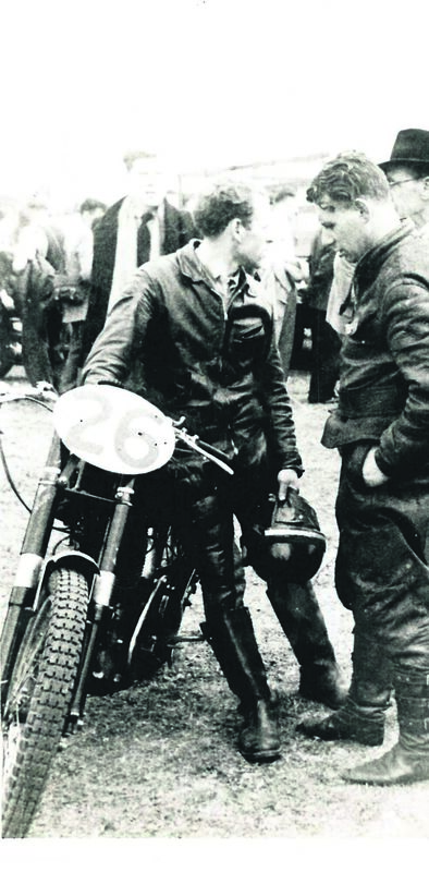 Tommy Foley in conversation with Eddie Wagner (right) at Wilton grasstrack. Eddie used to test his racing bikes on the ‘cowlucks’