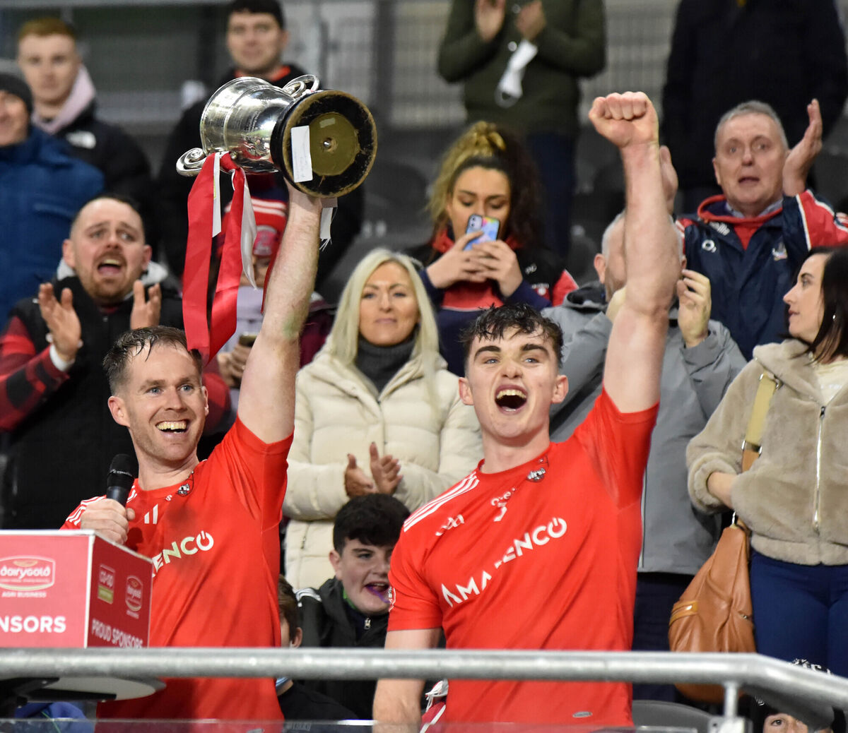 Castlemartyr joint captains Brian Lawton and Daragh Moran raise the Paddy Walsh trophy last weekend. Picture: Eddie O'Hare