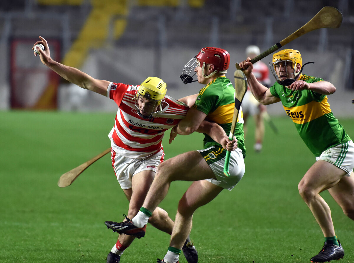 Courcey Rovers' Seán Twomey is tackled by Castlelyons' Jamie O'Leary and Leo Sexton. Picture: Eddie O'Hare