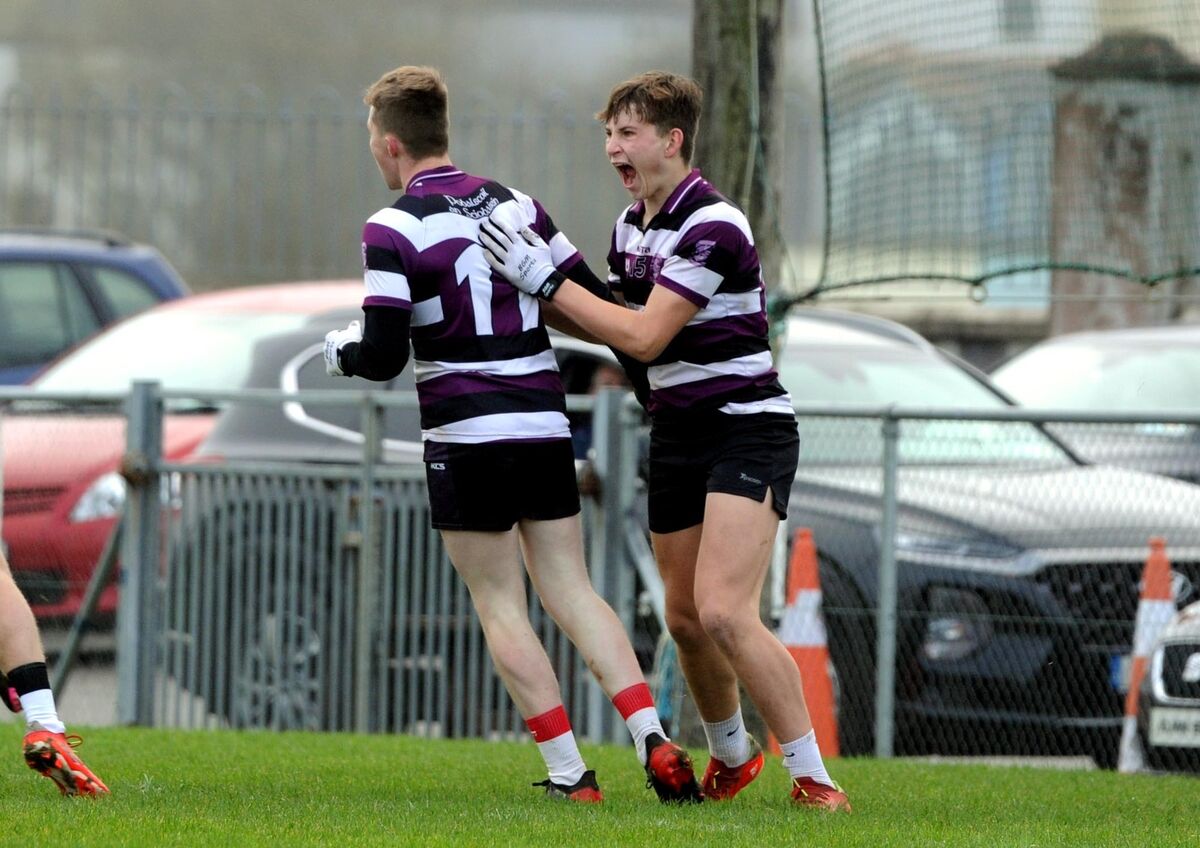Skibbereen Community School's Luke Shorten celebrating with Niall Daly after scoring a goal. Picture Denis Minihane.