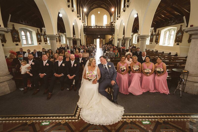 MR AND MRS: The couple at the top of the church, where they said their vows, at the Sacred Heart Church in Durrus. They were married by Fr James McSweeney in a beautiful ceremony.