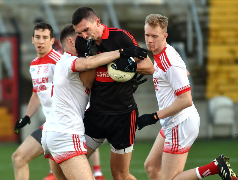 Mitchelstown's Shane Beston is tackled by Iveleary's Ciarán Galvin. Picture: Eddie O'Hare