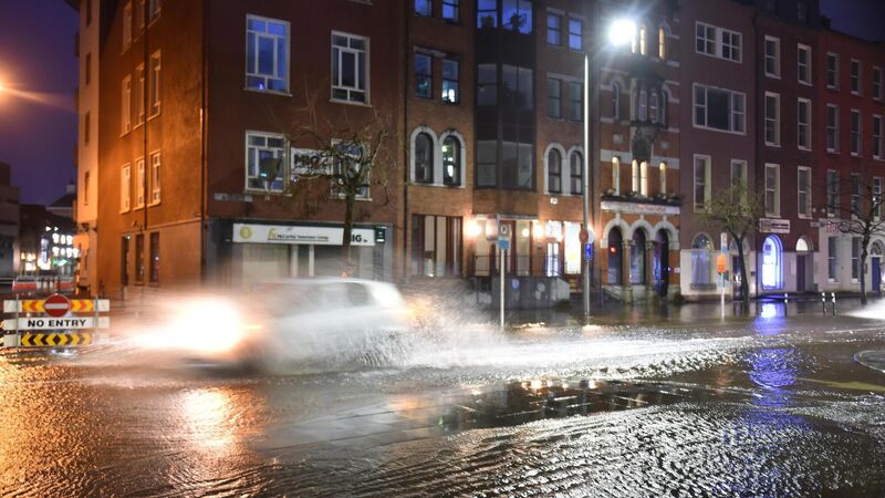 Watch: Businesses in Cork city narrowly escape flood damage during Storm Barra