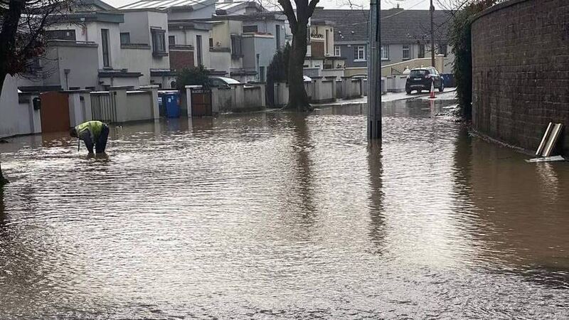 Street flooded and school forced to close following burst water main in Cork city Street flooded and school forced to close following burst water main in Cork city